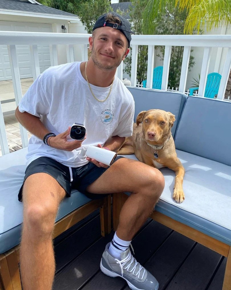 Eufy Security campaign, athlete with a Eufy camera and his dog